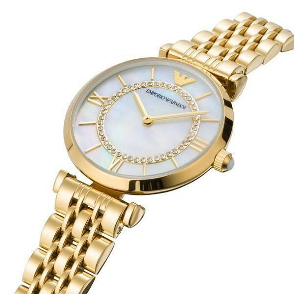 Angled view of Emporio Armani AR1907 showcasing polished gold finish and timeless elegance