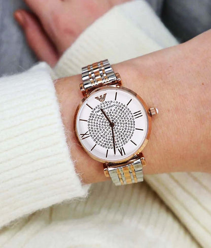 Close-up wrist shot of Emporio Armani AR1926 with dazzling pave crystal white dial