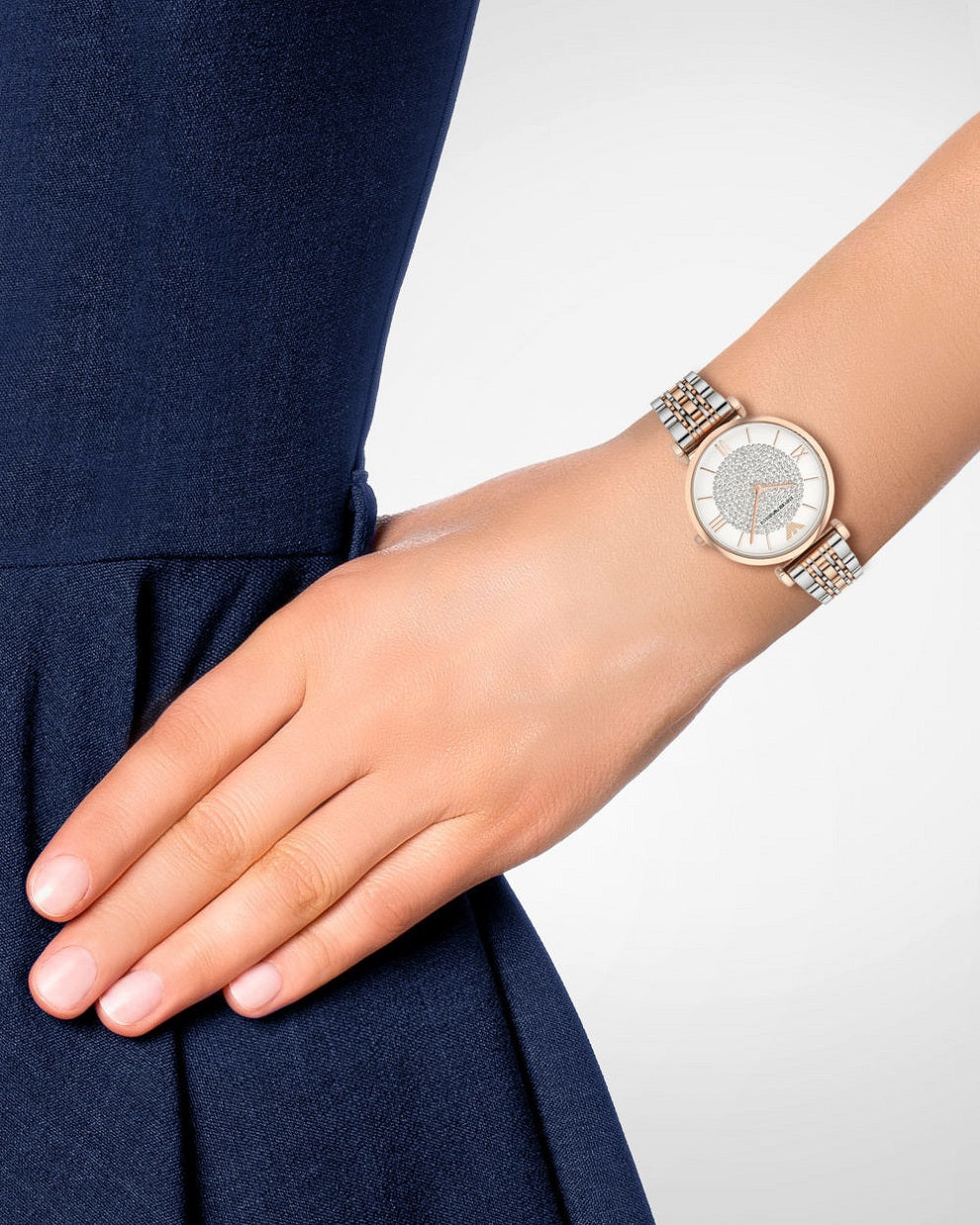 Full wrist view of AR1926 showing how the two-tone bracelet complements formal and casual looks