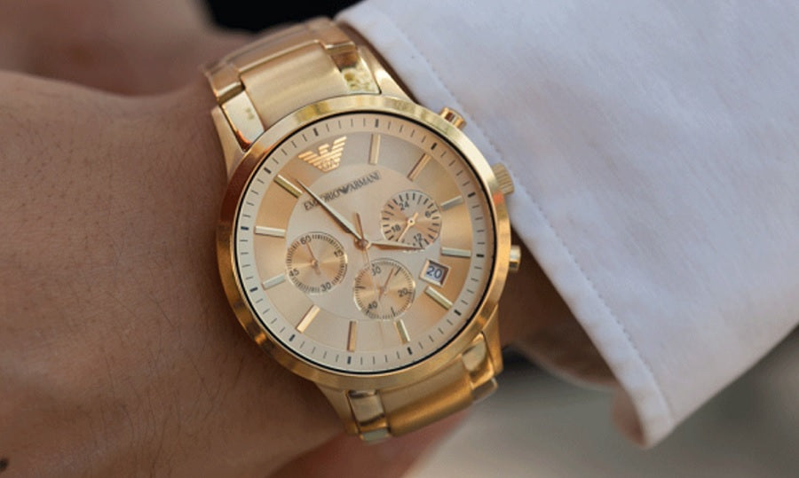 Close-up wrist shot of Emporio Armani AR2452 with rose gold dial and strap