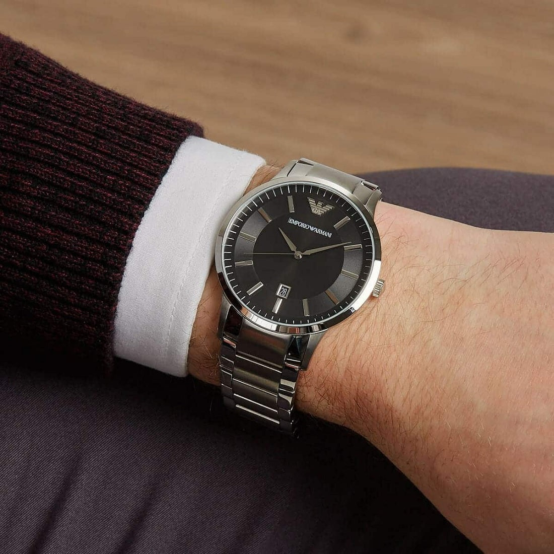 Emporio Armani AR2457 on wrist with black dial and stainless steel silver strap