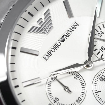 Extreme close-up of the Emporio Armani AR2458 Renato dial, highlighting the signature eagle logo, silver-tone hands, and textured chronograph sub-dials.