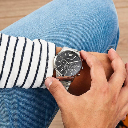 Emporio Armani AR2460 on wrist with black dial and stainless steel silver bracelet