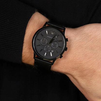 Emporio Armani AR2461 men’s watch on wrist with black leather strap and black dial
