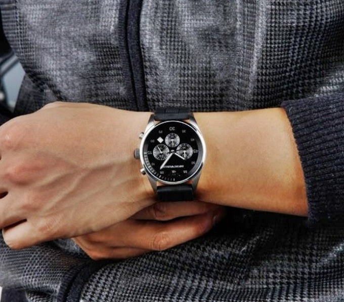 Emporio Armani AR5866 worn on wrist with black and grey silicone strap and silver case