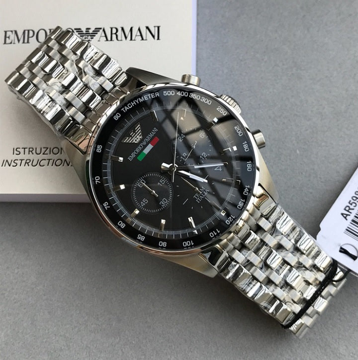 Angled shot of Emporio Armani AR5983 showcasing black dial and stainless steel silver strap