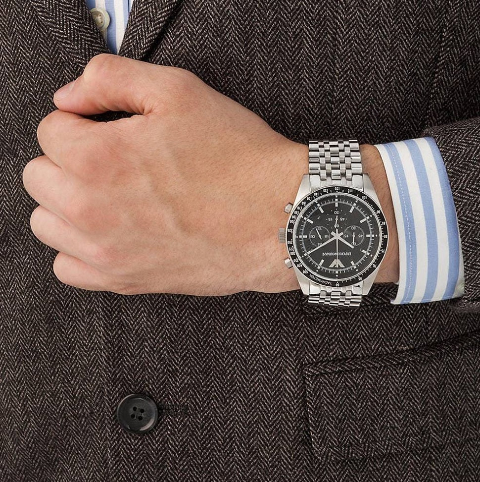Emporio Armani AR5988 worn on wrist with black dial and stainless steel silver strap