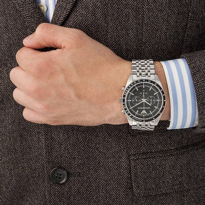 Emporio Armani AR5988 worn on wrist with black dial and stainless steel silver strap