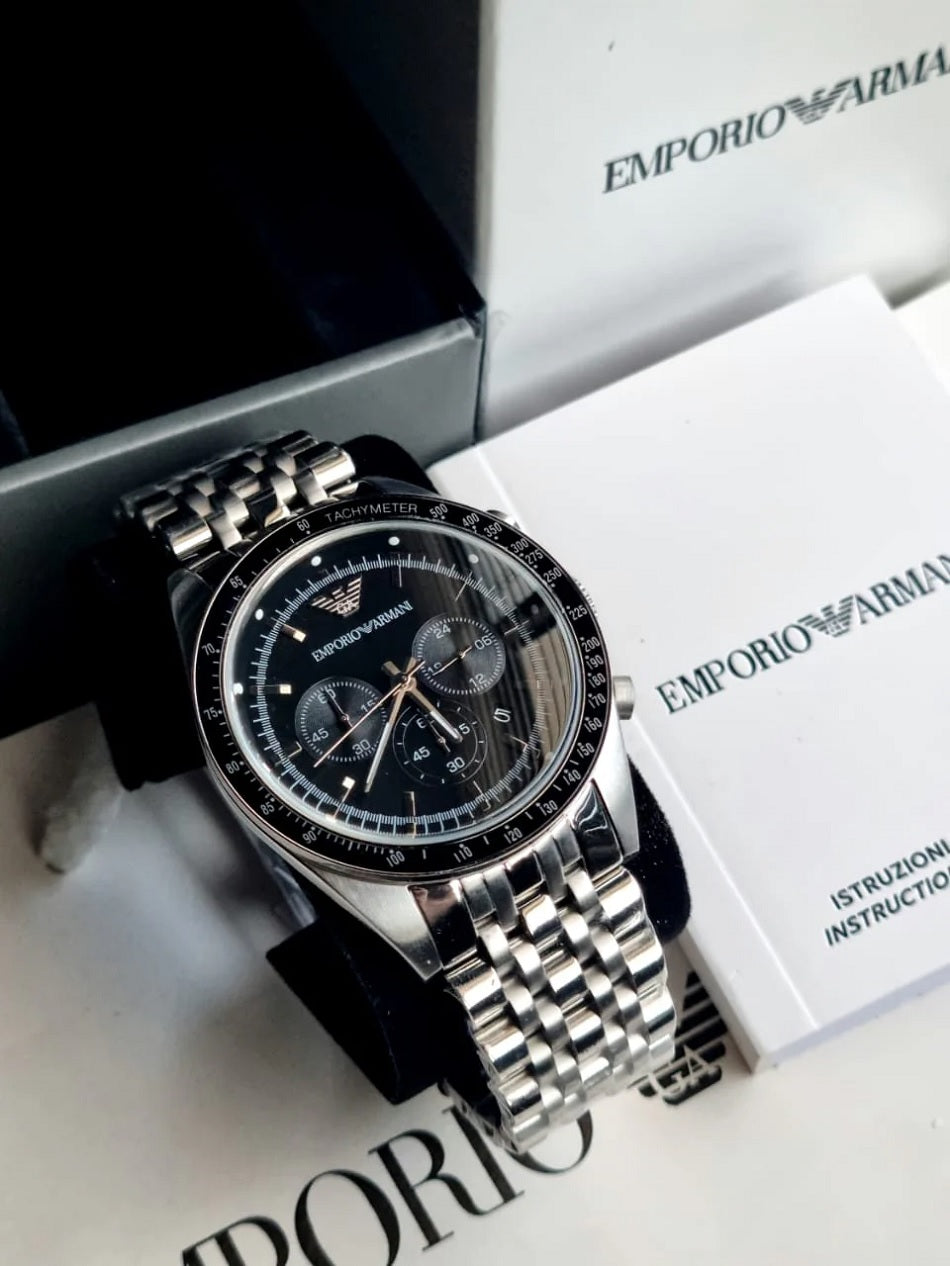 Emporio Armani AR5988 Sportivo men’s watch displayed on branded pillow with stainless steel silver strap and black dial