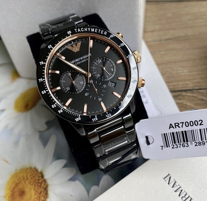 Emporio Armani AR70002 displayed on pillow with black dial