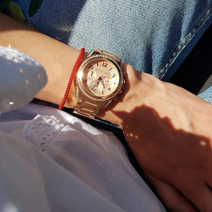 Michael Kors MK5263 rose gold watch with crystal bezel worn on wrist, elegant and bold look