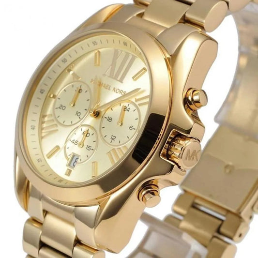 Close-up of gold dial on Michael Kors MK5605 with chronograph subdials