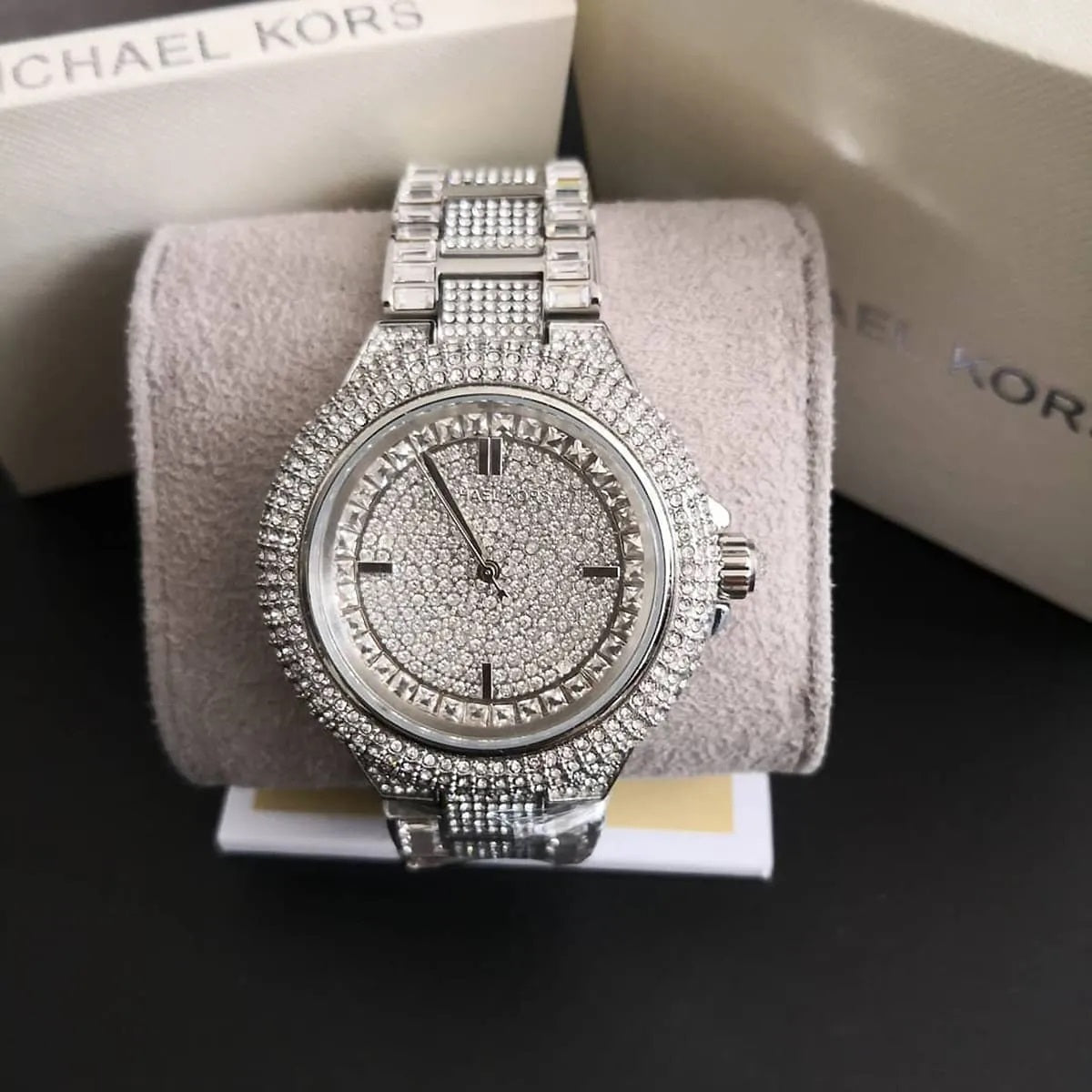 Close-up of case and lugs on Michael Kors MK5869 women's stainless steel silver-tone watch