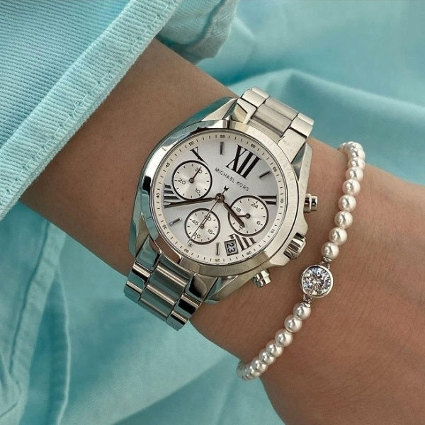 Dial hands and indices detail on Michael Kors MK6174 women's silver-tone watch