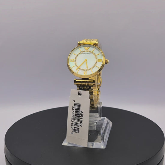 360-degree rotating view of Emporio Armani AR1907 women's rose gold-tone stainless steel watch with white mother-of-pearl dial and mesh bracelet.