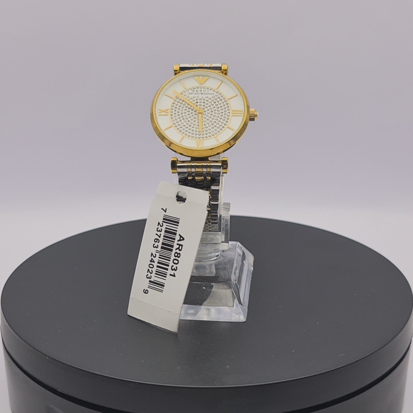 360-degree rotating view of Emporio Armani AR8031 women's silver stainless steel watch with mother of pearl dial.