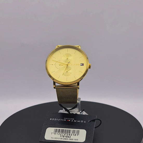 360-degree rotating view of Tommy Hilfiger 1781943 women's silver stainless steel watch with white dial and white silicone strap.