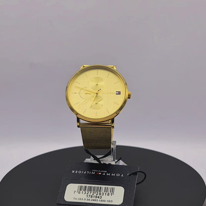 360-degree rotating view of Tommy Hilfiger 1781943 women's silver stainless steel watch with white dial and white silicone strap.