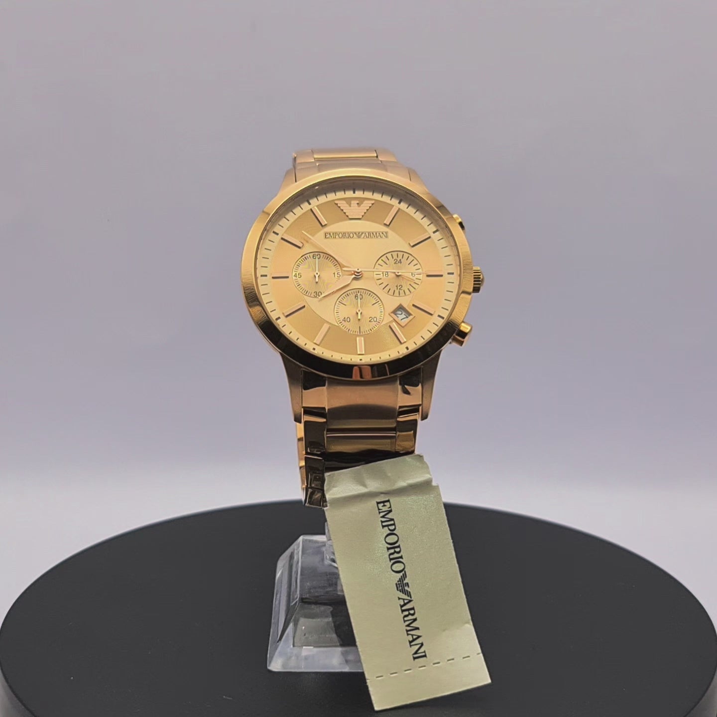 360-degree rotating view of Emporio Armani AR2452 men's rose gold-tone stainless steel chronograph watch with silver dial.