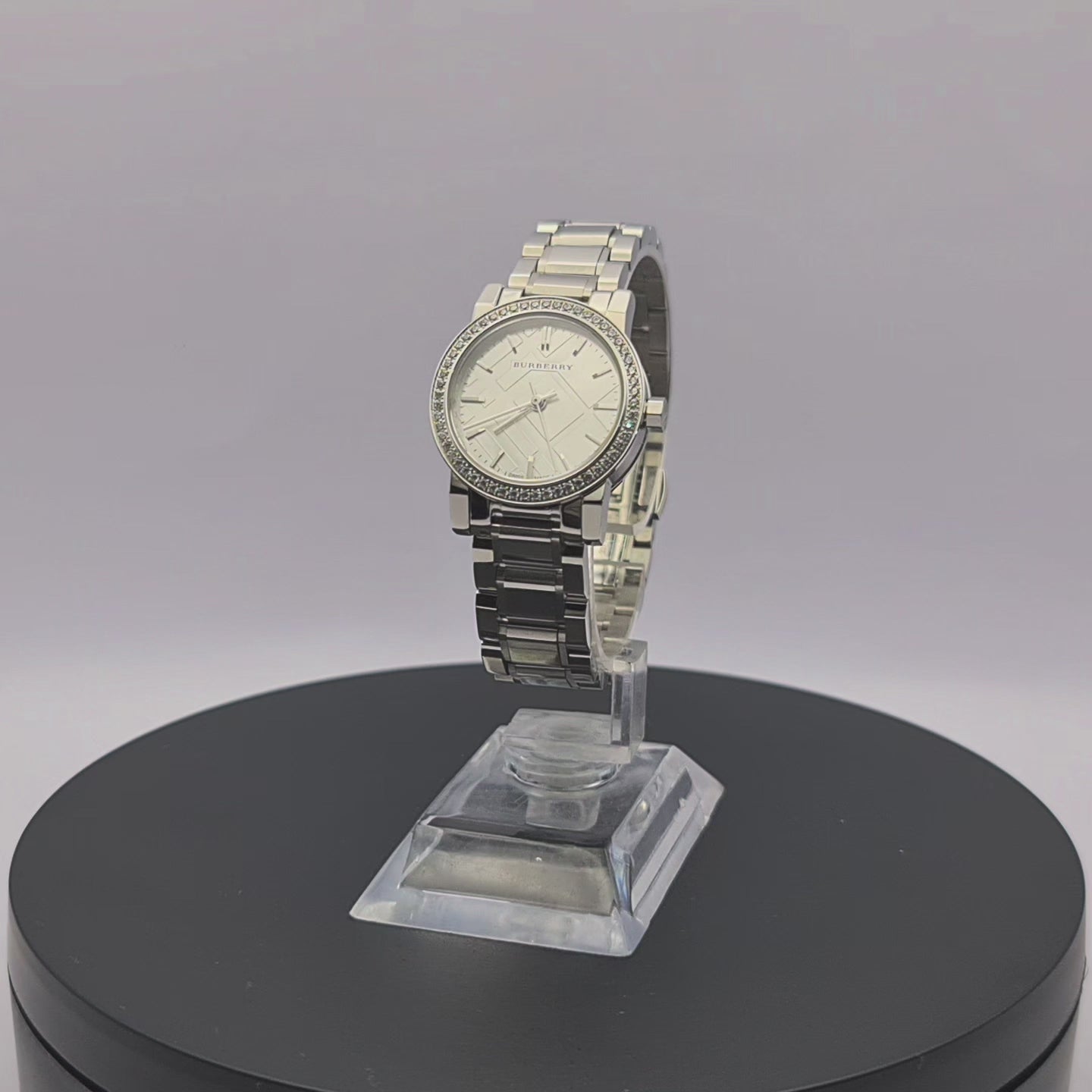 360-degree rotating view of Burberry BU9220 petite 26mm silver watch with diamond details.