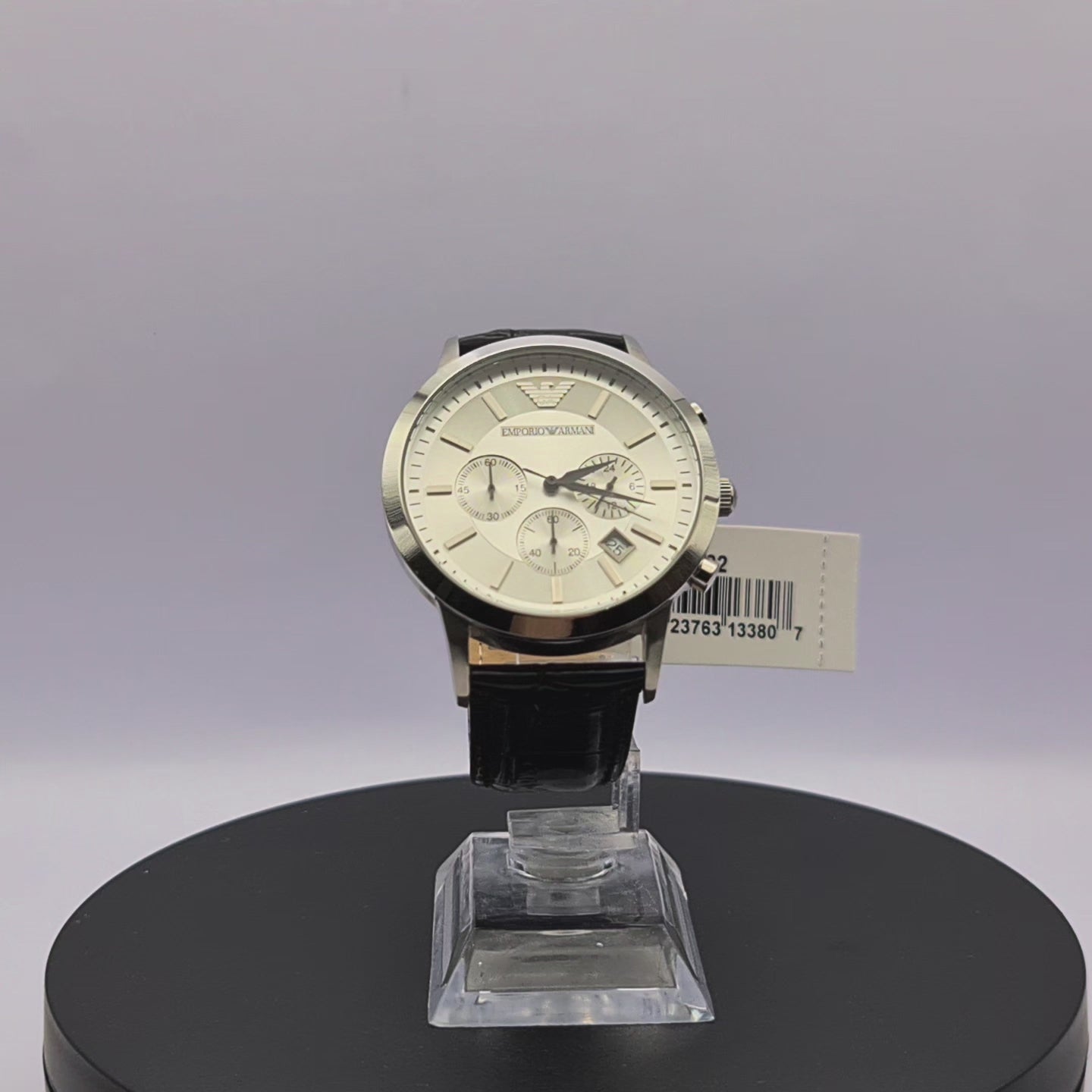 360-degree rotating view of Emporio Armani AR2432 men's silver stainless steel chronograph watch with silver dial and black leather strap.