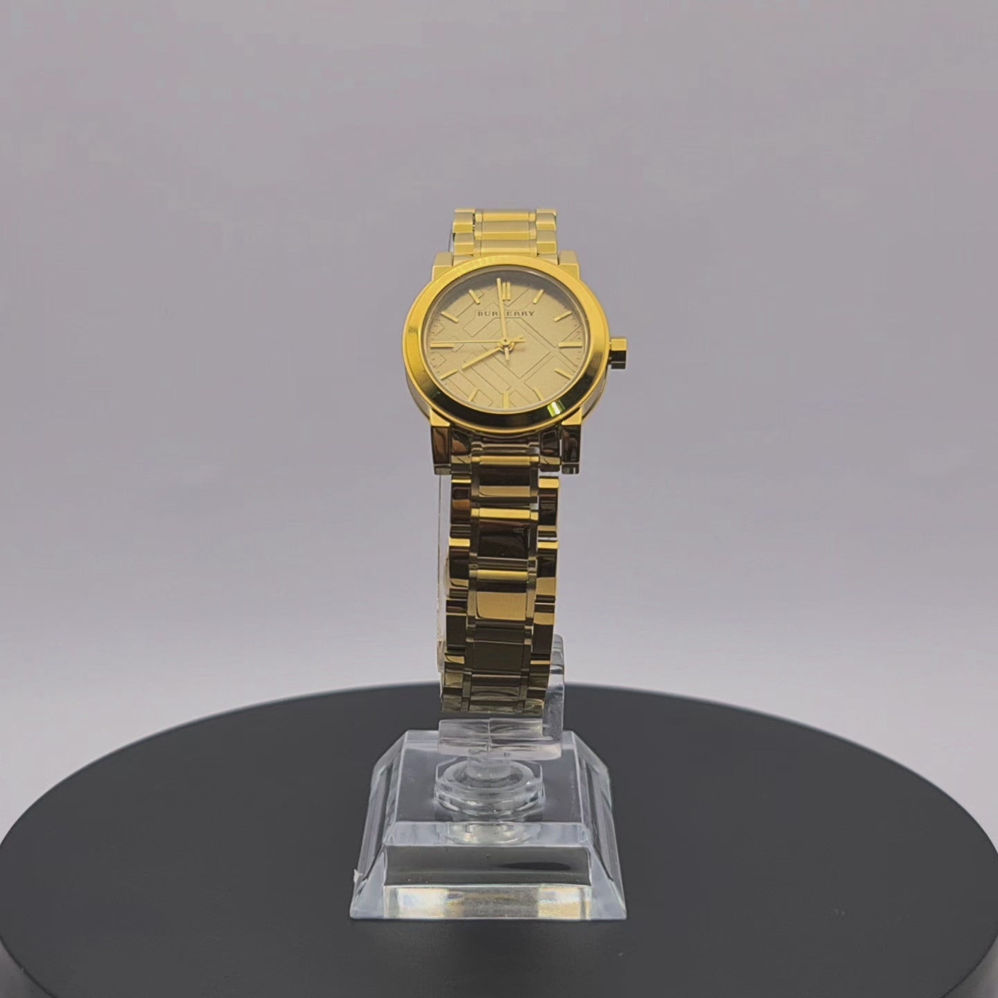 360-degree rotating view of Burberry BU9227 petite rose gold watch with diamond hour markers.