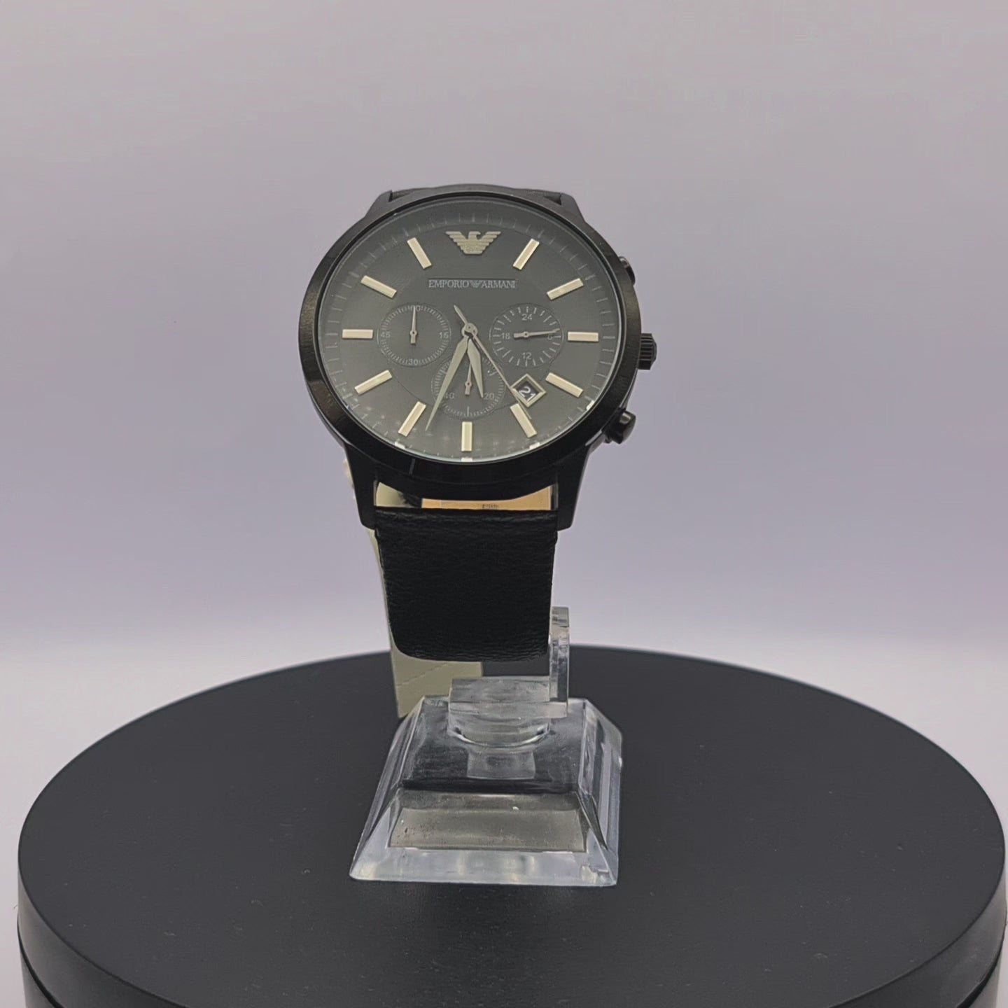 360-degree rotating view of Emporio Armani AR2461 men's black stainless steel chronograph watch with black dial and black leather strap.