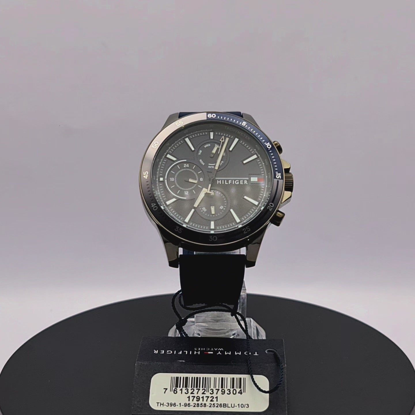 360-degree rotating view of Tommy Hilfiger 1791721 Bank watch with gunmetal case and blue silicone strap.