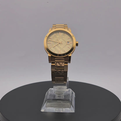 360-degree rotating view of Burberry BU9146 women's rose gold watch with engraved check bracelet.