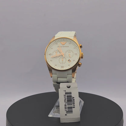 360-degree rotating view of Emporio Armani AR5919 men's white and rose gold chronograph watch with white silicone-wrapped bracelet.