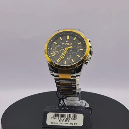 360-degree rotating view of Tommy Hilfiger 1791559 Decker men's silver stainless steel watch with navy blue dial.