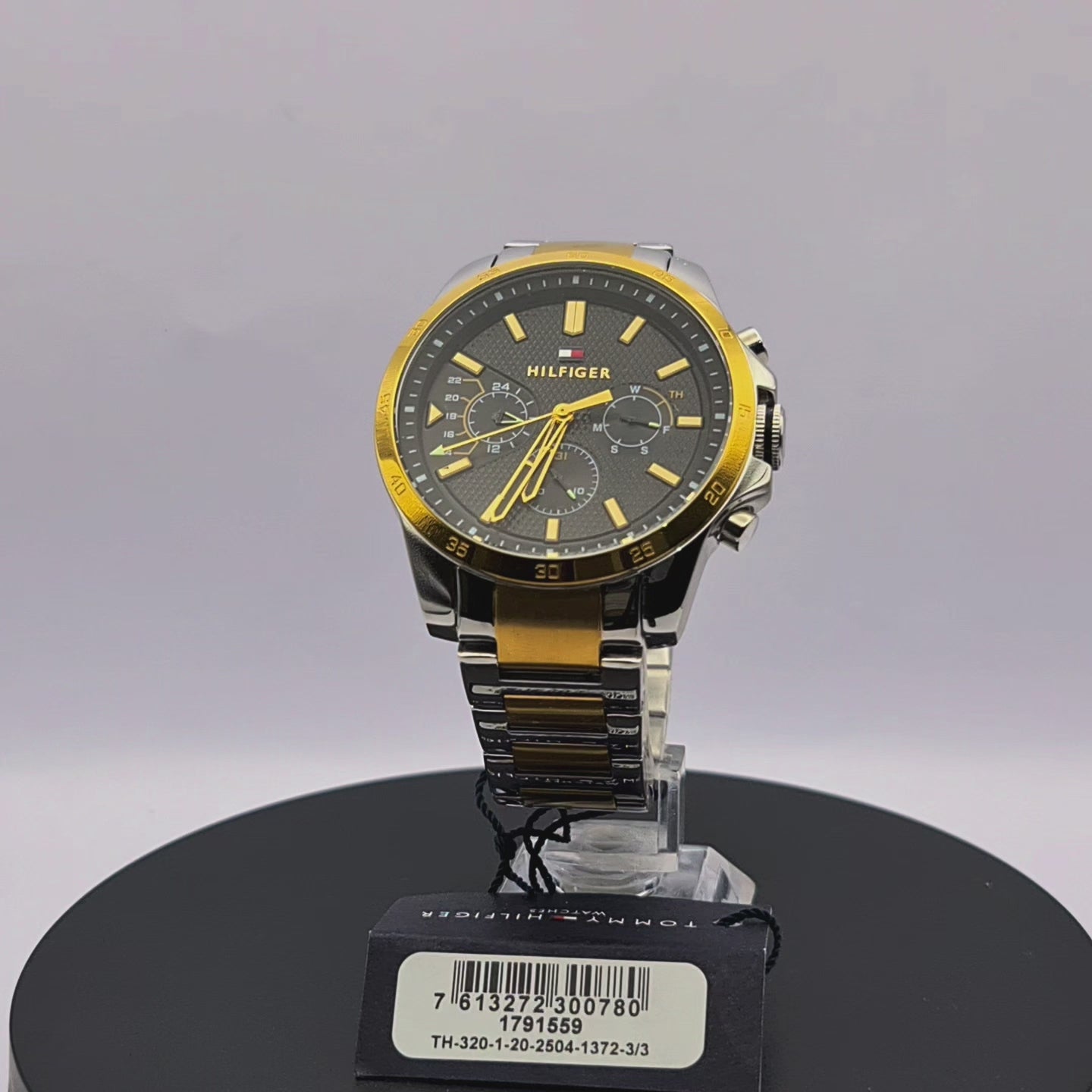 360-degree rotating view of Tommy Hilfiger 1791559 Decker men's silver stainless steel watch with navy blue dial.