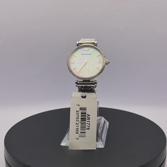 360-degree rotating view of Emporio Armani AR1779 women's silver stainless steel watch with pink mother-of-pearl dial and crystal-set bezel.