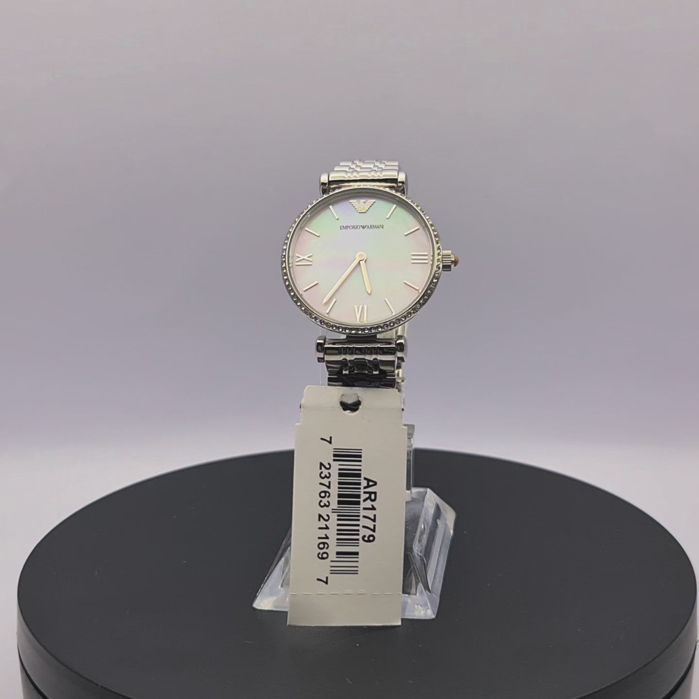 360-degree rotating view of Emporio Armani AR1779 women's silver stainless steel watch with pink mother-of-pearl dial and crystal-set bezel.