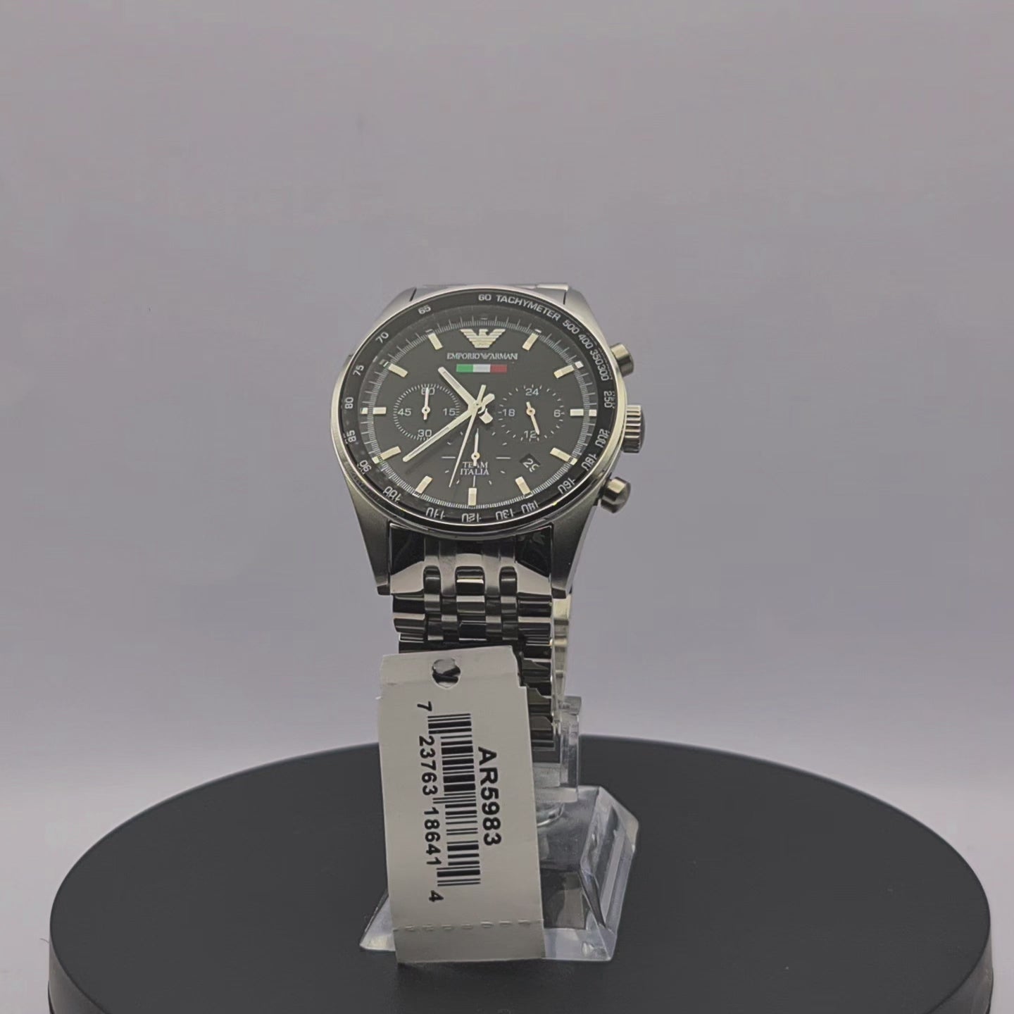 360-degree rotating view of Emporio Armani AR5983 men's silver stainless steel chronograph watch with black dial and black rubber strap.