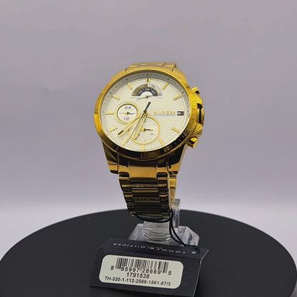 360-degree rotating view of Tommy Hilfiger 1791538 men's gold-tone stainless steel mesh watch with navy blue dial.