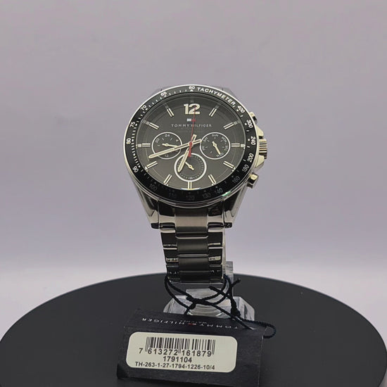 360-degree rotating view of Tommy Hilfiger 1791104 men's silver stainless steel watch with white dial and brown leather strap