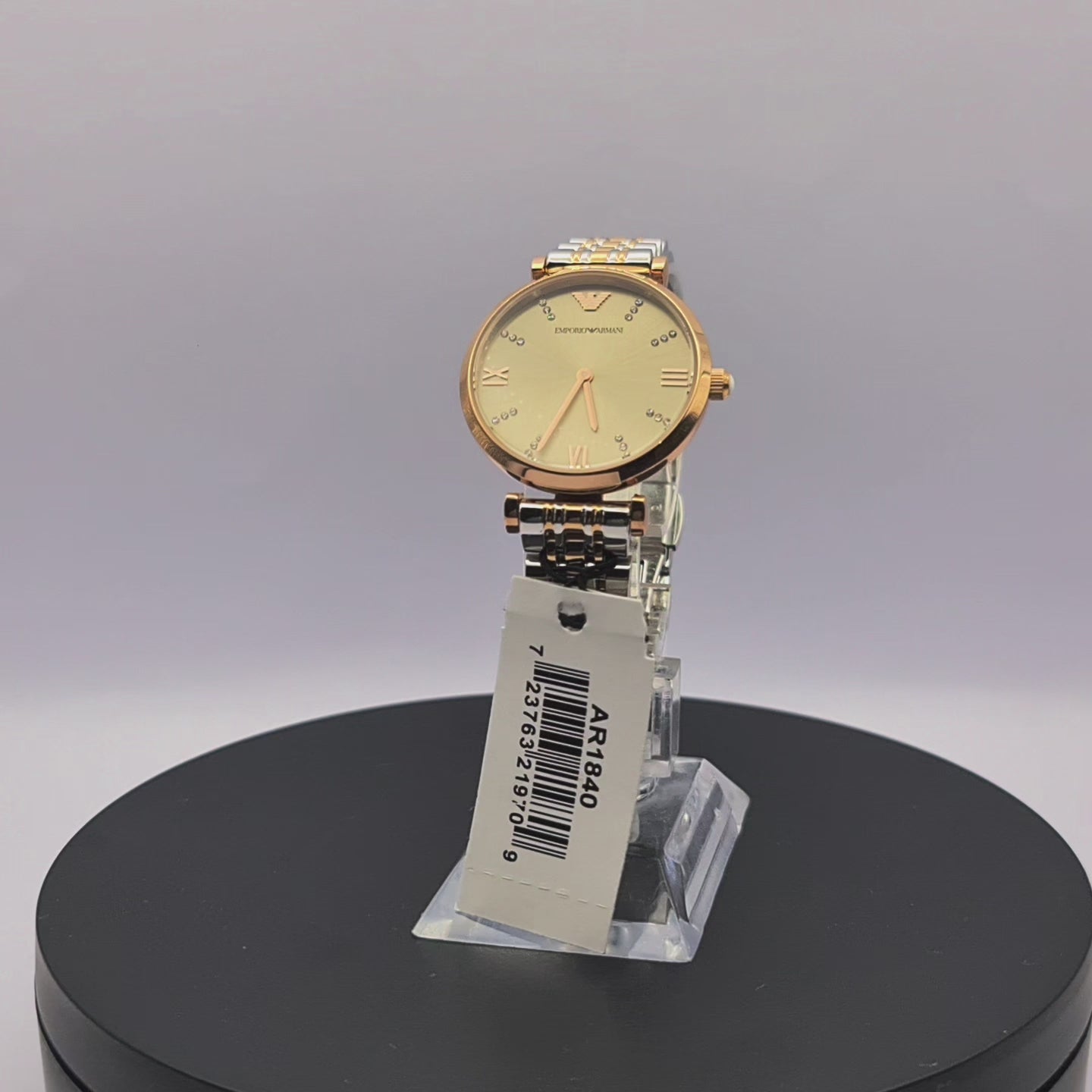 360-degree rotating view of Emporio Armani AR1840 women's two-tone stainless steel watch with grey dial.