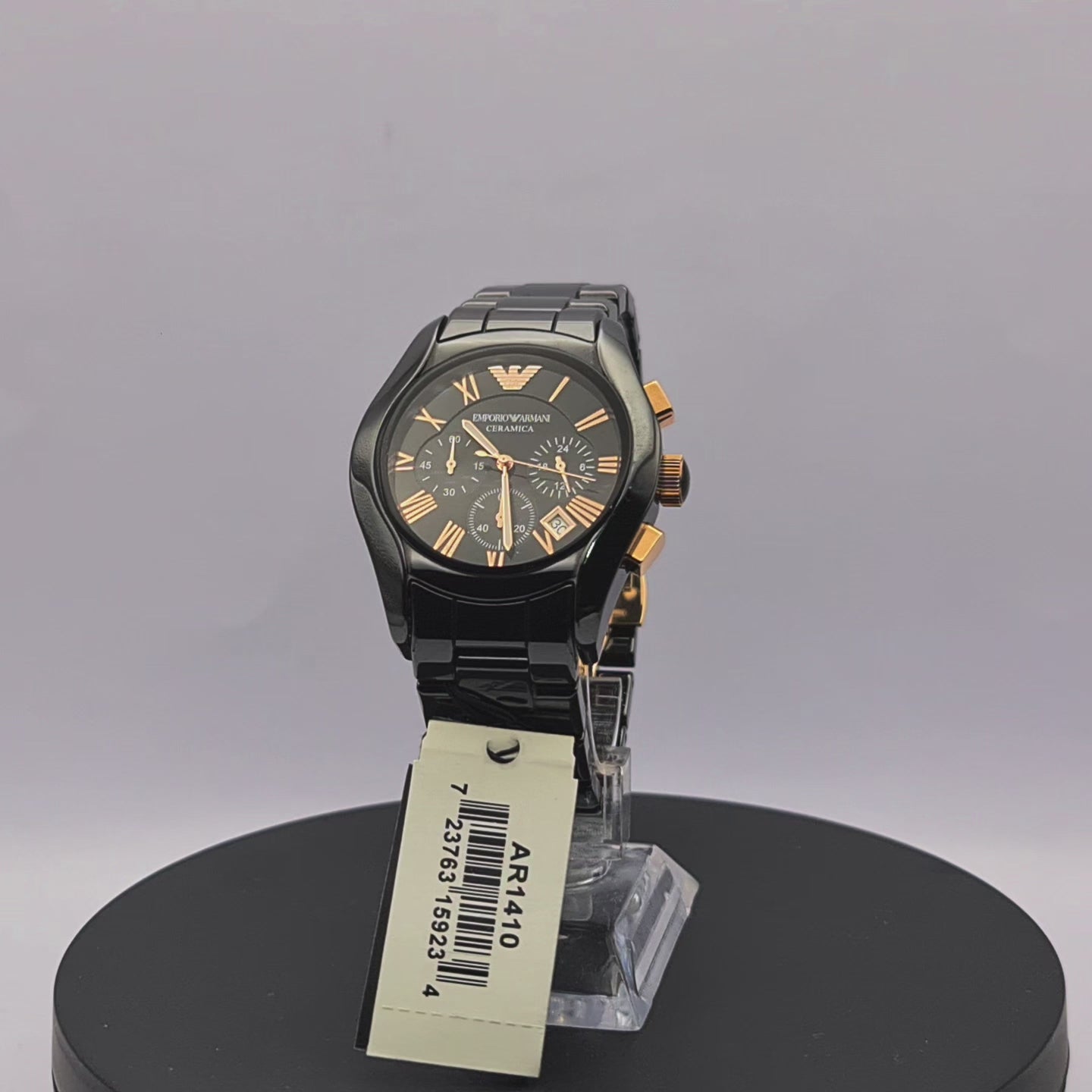 360-degree rotating view of Emporio Armani AR1410 men's black ceramic chronograph watch with black dial and rose gold-tone Roman numeral hour markers.