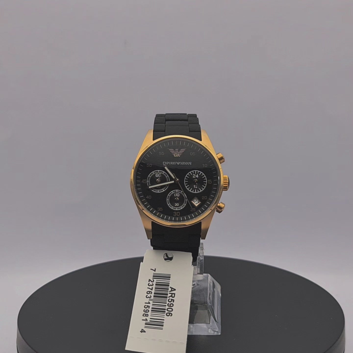 360-degree rotating view of Emporio Armani AR5906 women's rose gold and black chronograph watch with black silicone-wrapped bracelet.