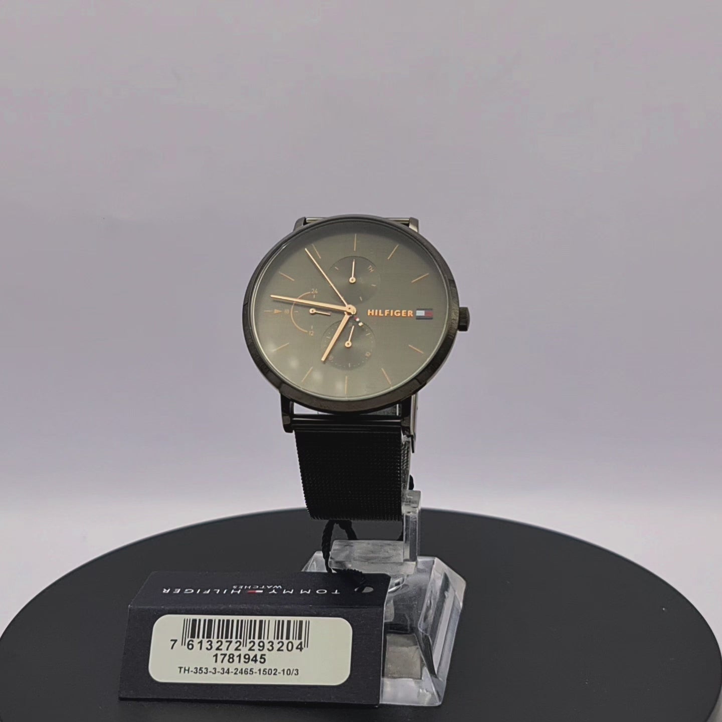 360-degree rotating view of Tommy Hilfiger 1781945 women's rose gold watch with navy blue silicone strap.