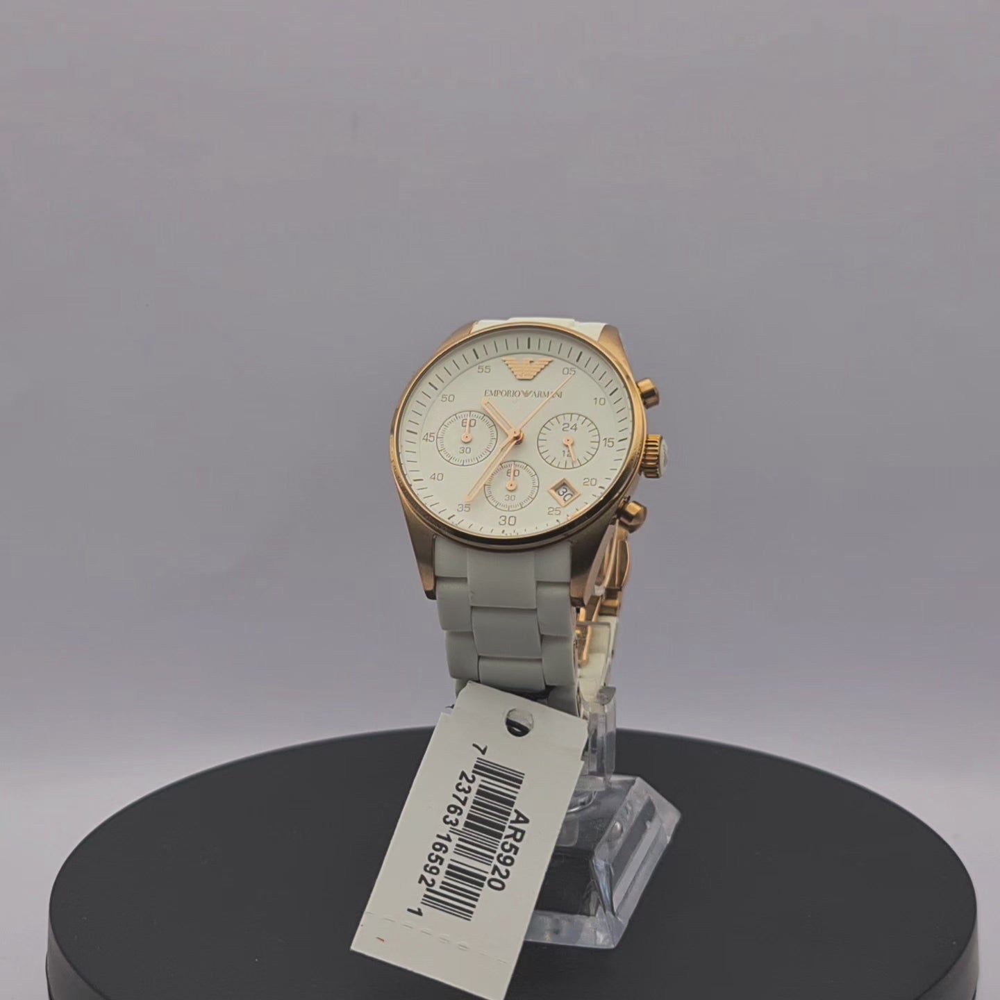 360-degree rotating view of Emporio Armani AR5920 women's rose gold and white chronograph watch with white silicone strap.