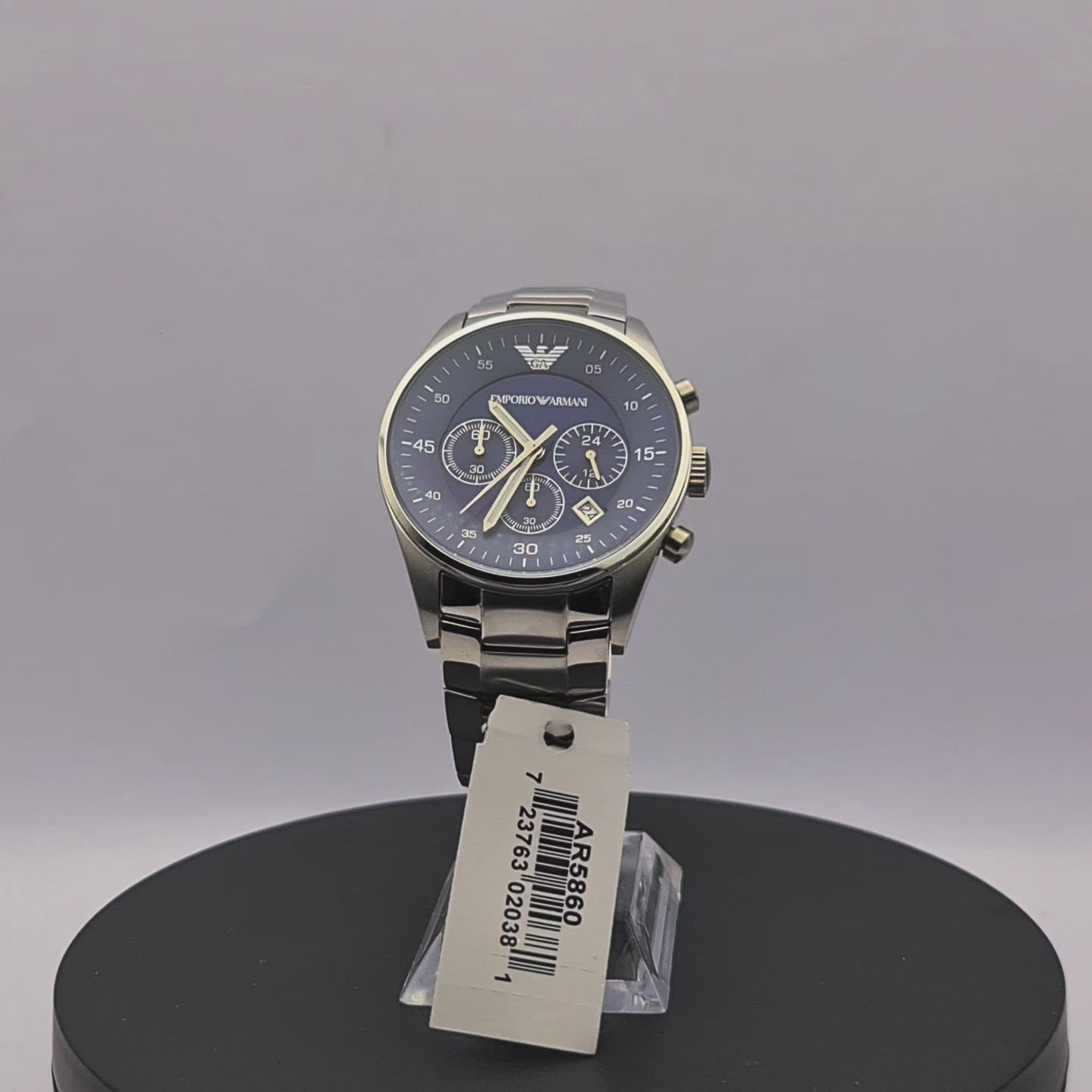 360-degree rotating view of Emporio Armani AR5860 men's silver stainless steel chronograph watch with blue dial.