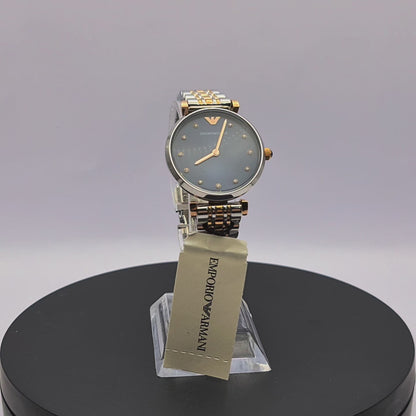 360-degree rotating view of Emporio Armani AR11092 Gianni T-Bar women's two-tone stainless steel watch with blue dial and crystal markers.