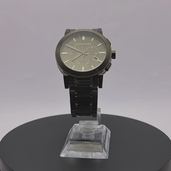 360-degree rotating view of Burberry BU9354 gunmetal chronograph watch with stamped check dial pattern.