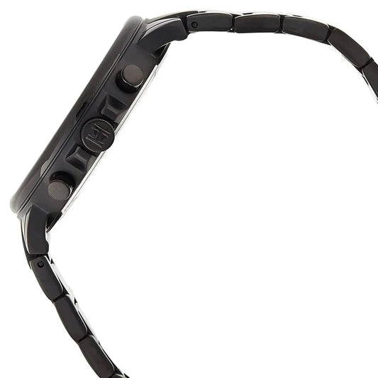 Side profile view of the Tommy Hilfiger 1710414 highlighting the slim black-tone case, textured crown, and chronograph pushers.