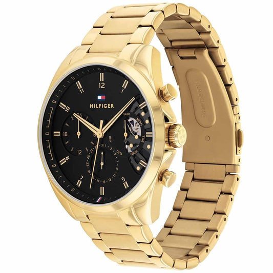 Angled 45-degree view of the Tommy Hilfiger 1710447 showing the brushed and polished finishes on the gold-plated link bracelet.