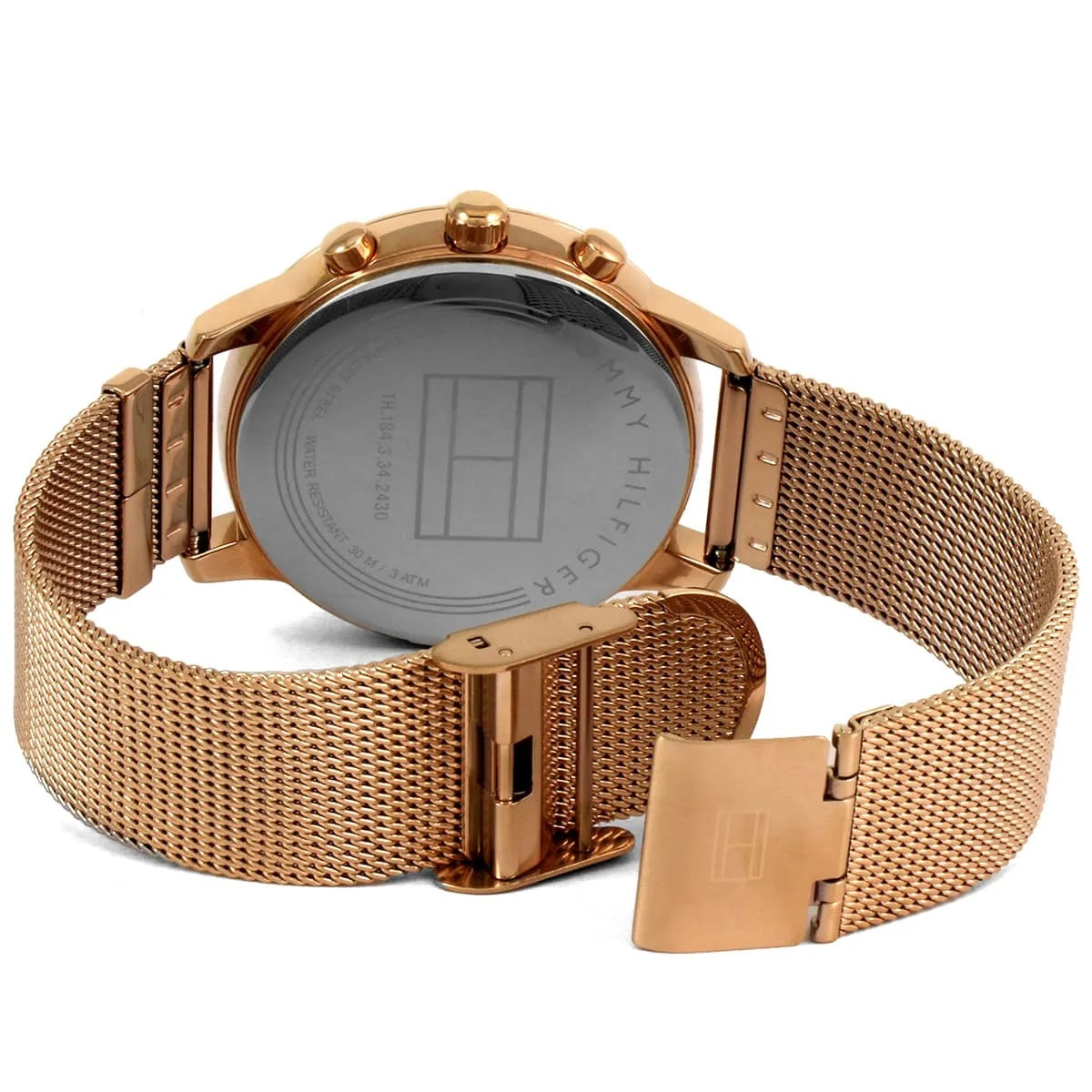 Rear view of the Tommy Hilfiger 1781907 highlighting the adjustable rose gold mesh sliding clasp and engraved stainless steel case back.