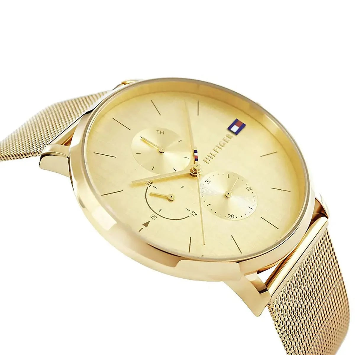Angled shot of Tommy Hilfiger 1781943 women’s watch featuring a gold mesh strap and gold dial