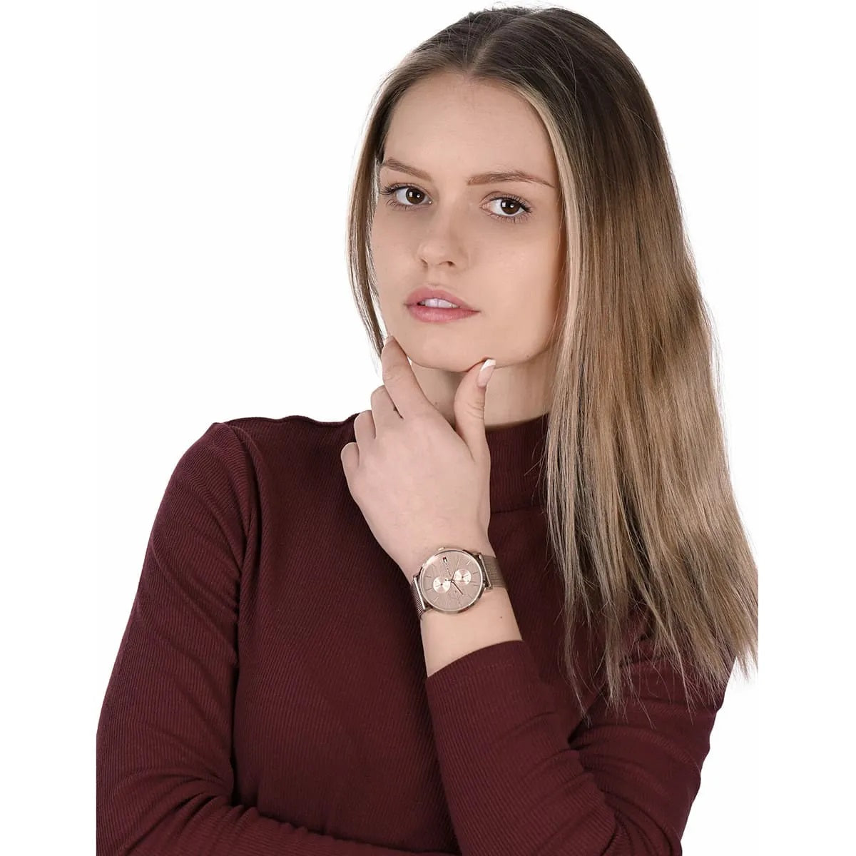 Tommy Hilfiger 1781944 women's watch with a rose gold dial and mesh strap worn on wrist for a chic look